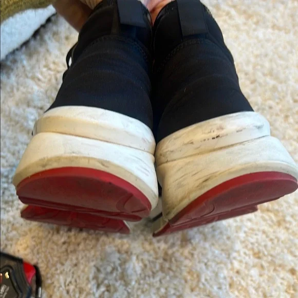 Authentic Christian Louboutin Black and Silver Studded Sneakers - Picture 8 of 11